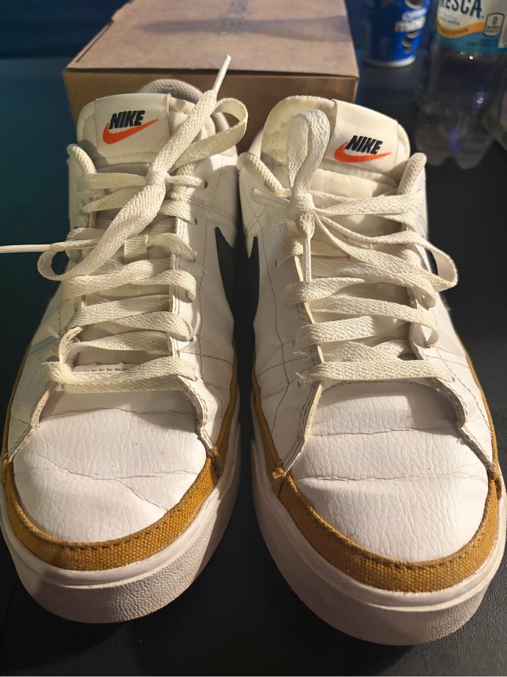 Nike White Sneakers with Orange and Mustard Accents